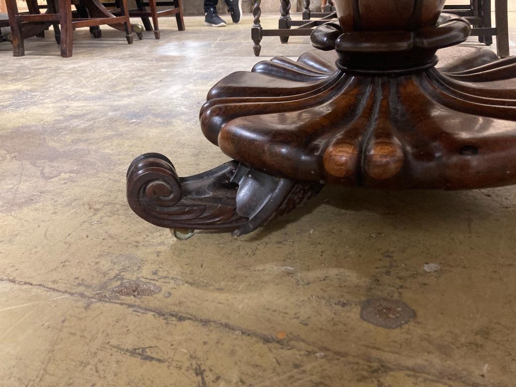 An early Victorian rosewood circular breakfast table, diameter 136cm, height 74cm Diameter 52in